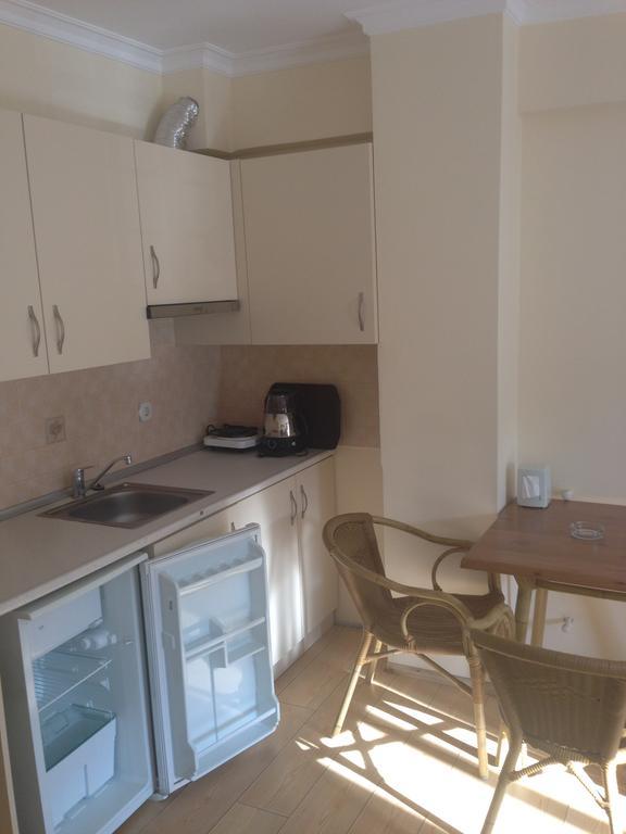 Zeytin Apart Hotel Кешме Экстерьер фото