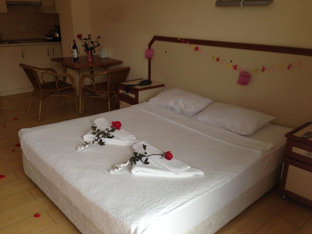 Zeytin Apart Hotel Кешме Экстерьер фото
